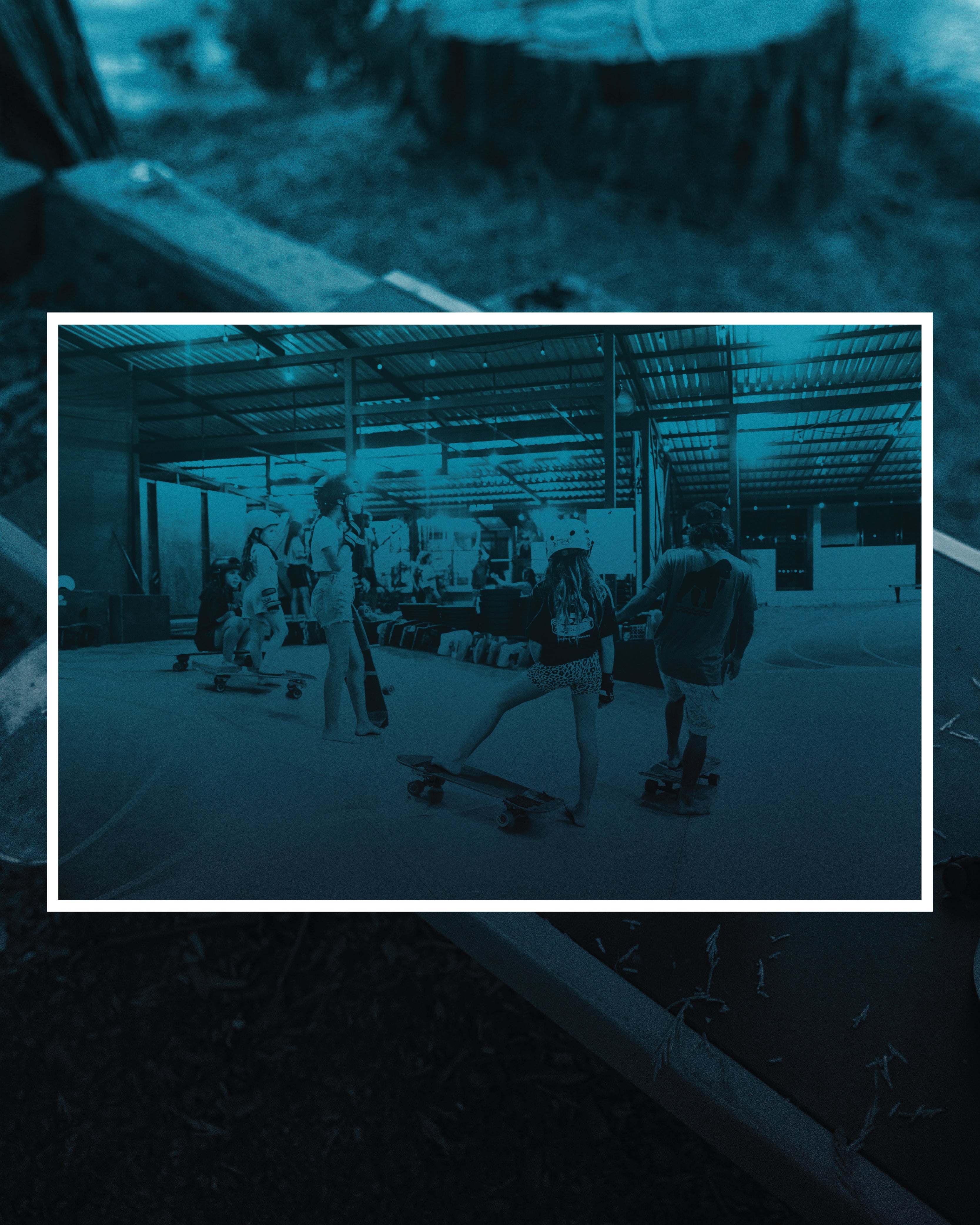A monochromatic dark teal image displays people skateboarding indoors, framed by a white border.