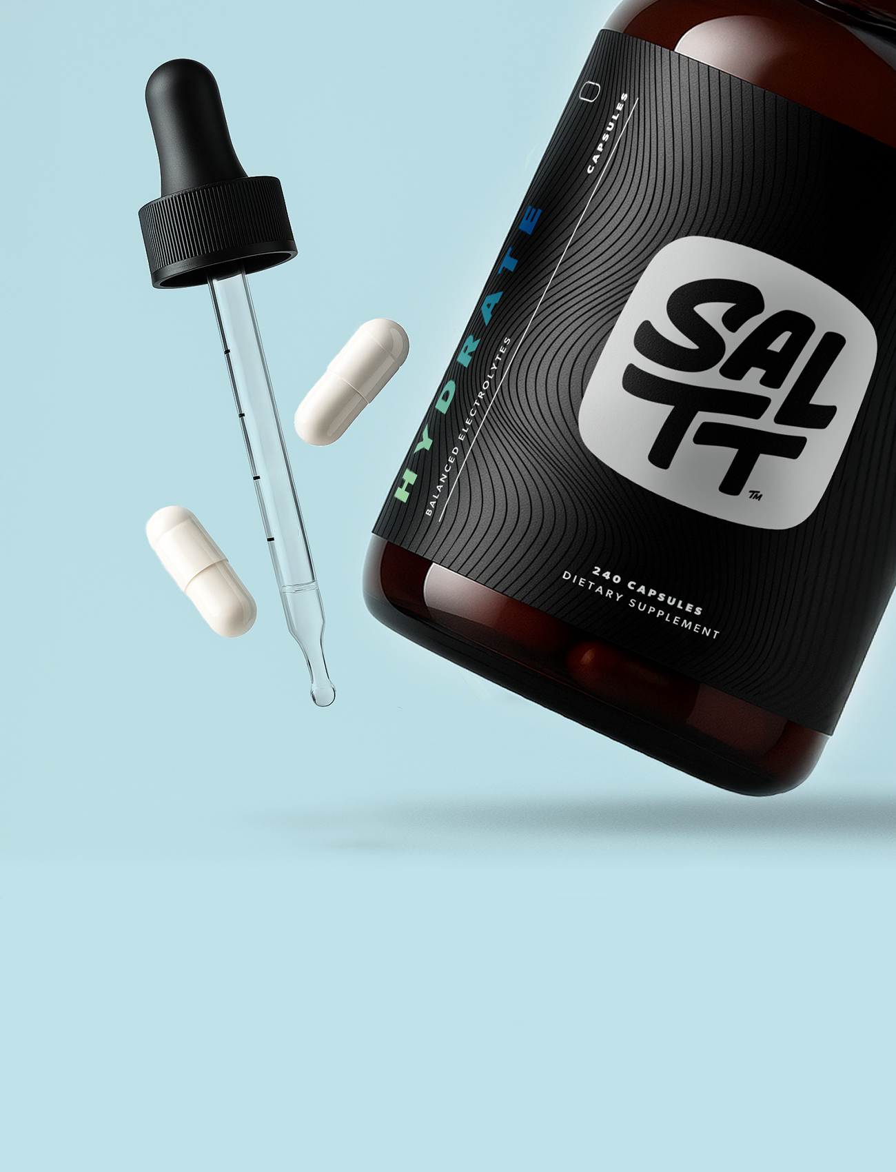 Bottle of SALTT Hydrate formula with dropper and capsules on a light blue background