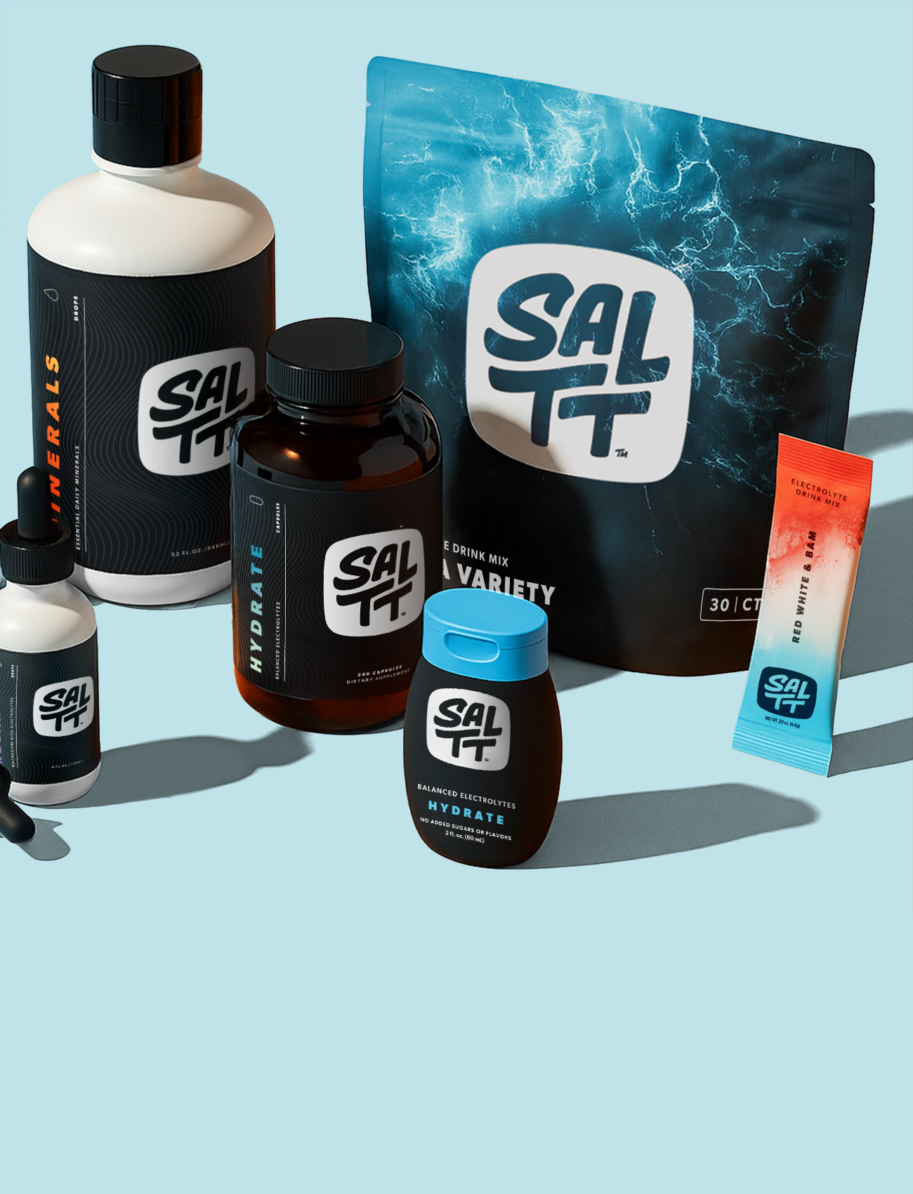 Collection of SALTT products including a 30 count bag and bottles of capsules and drops on a light blue background