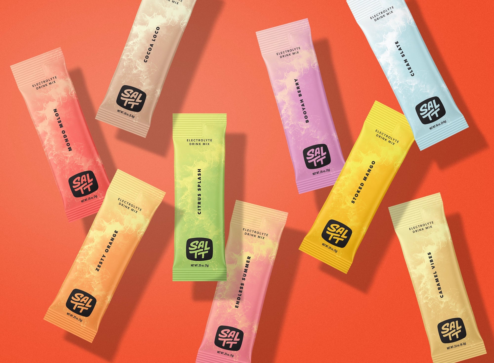 Nine colorful SALTT Electrolyte Drink Mix stick packets. Each features ocean splash graphics, a unique flavor name, the SALTT logo, and net weight.