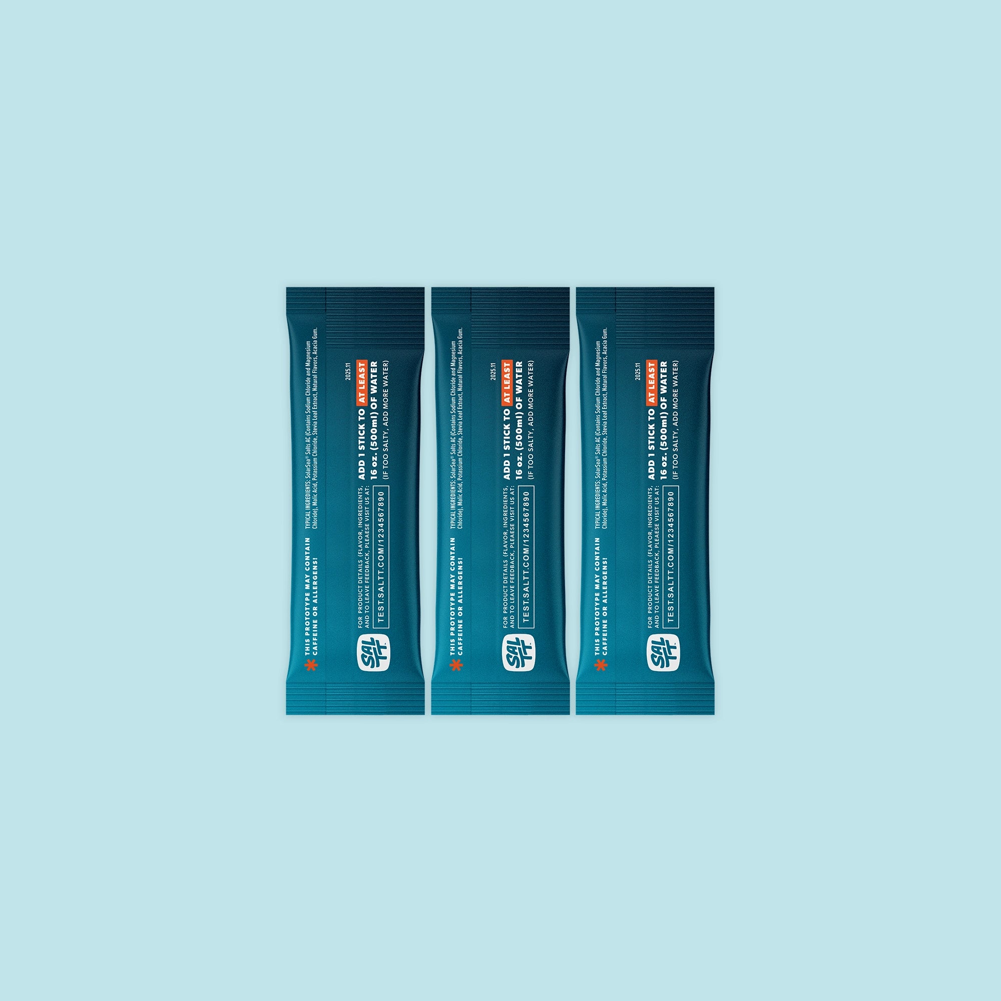 Three teal SALTT stick-pack pouches featuring a light blue ocean water splash graphic and white text for brand and product information.