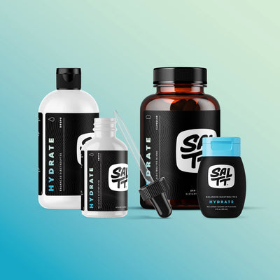 SALLT Hydrate 8oz, 4oz and 2oz liquid bottles and capsule bottle on a blue gradient background.