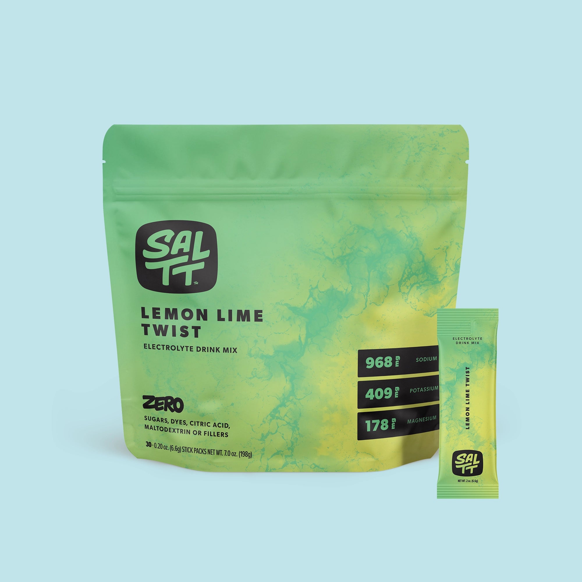 Green SALTT Lemon Lime Twist Electrolyte Drink Mix stand-up pouch with a light green ocean water splash pattern, displaying the SALTT logo, product name, 'Zero Sugars, Dyes, Citric Acid, Maltodextrin or Fillers', '30 - 0.20 oz. (6.6g) Stick Packs Net Wt. 7.0 oz. (198g)', and electrolyte content for Sodium, Potassium, and Magnesium. A matching single-serving stick pack stands to the right.