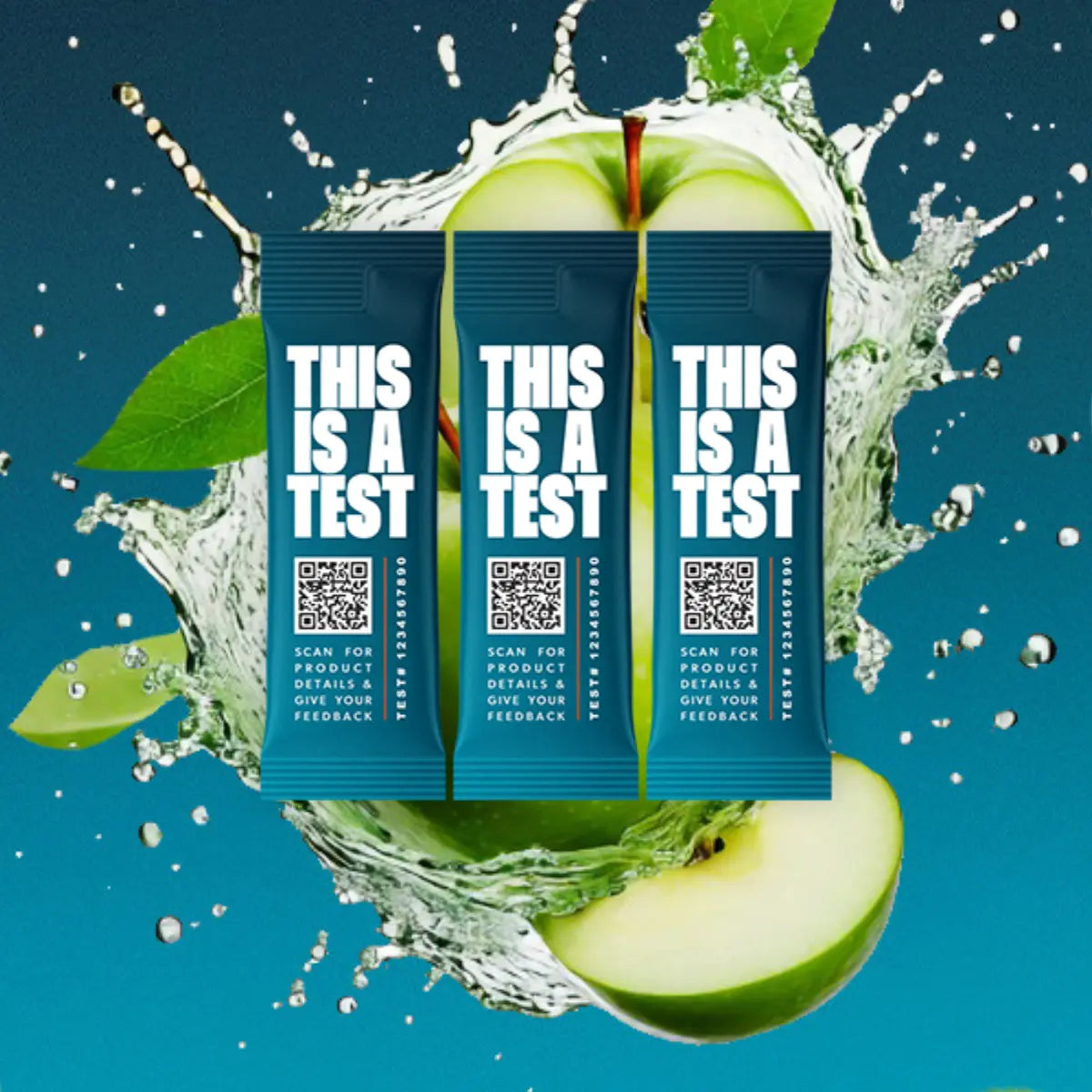 Three teal THIS IS A TEST single-serve stick packs with QR codes. Green apple slices and water splashes on a blue-green background.